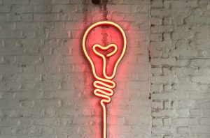Giant bulb sign. Orange LED neon.